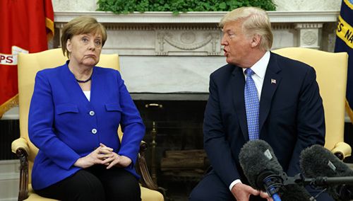 Меркель и Трамп. © AP Photo / Evan Vucci